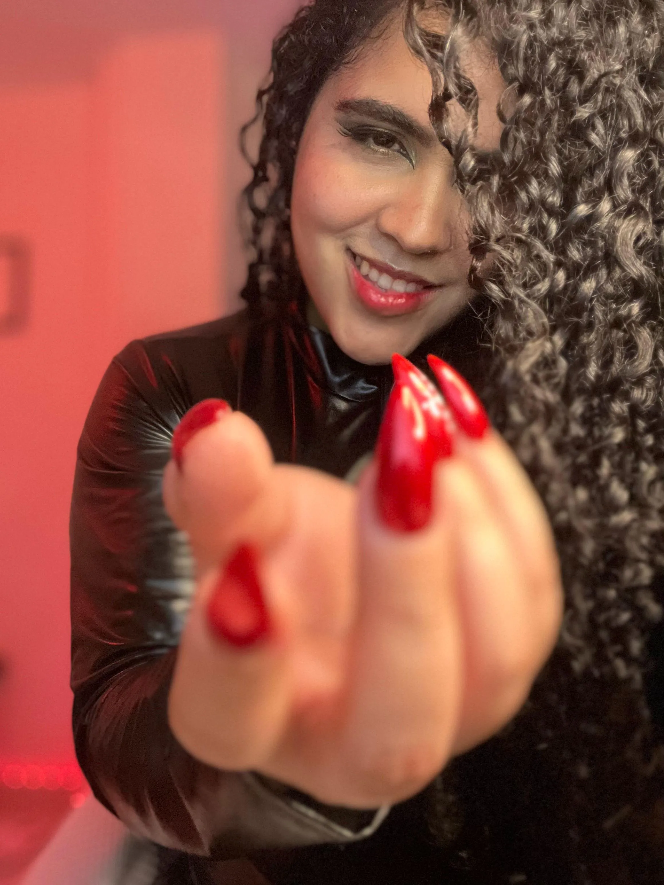 The power of red nails is undeniable.