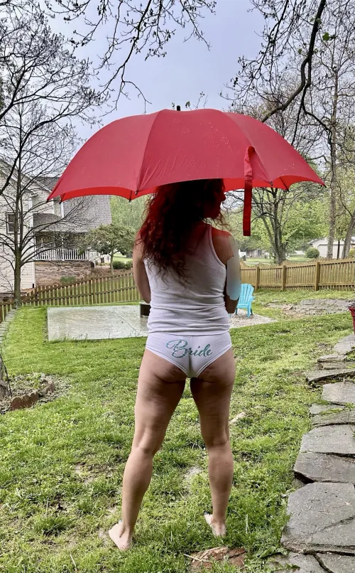 A little rain doesn’t dampen Annie’s (wife, 56) spirits…