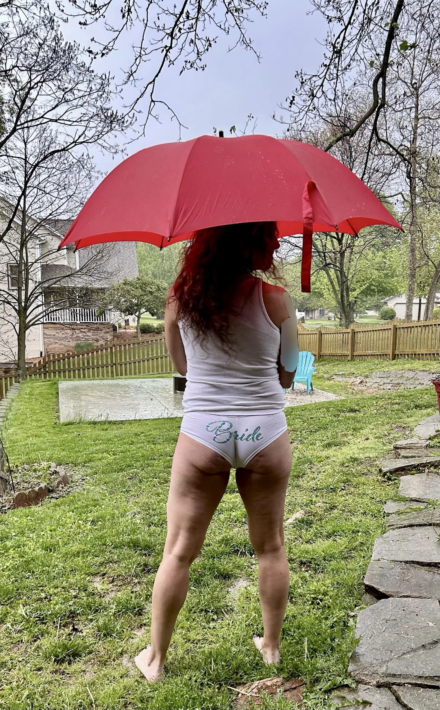 A little rain doesn’t dampen Annie’s (wife, 56) spirits…