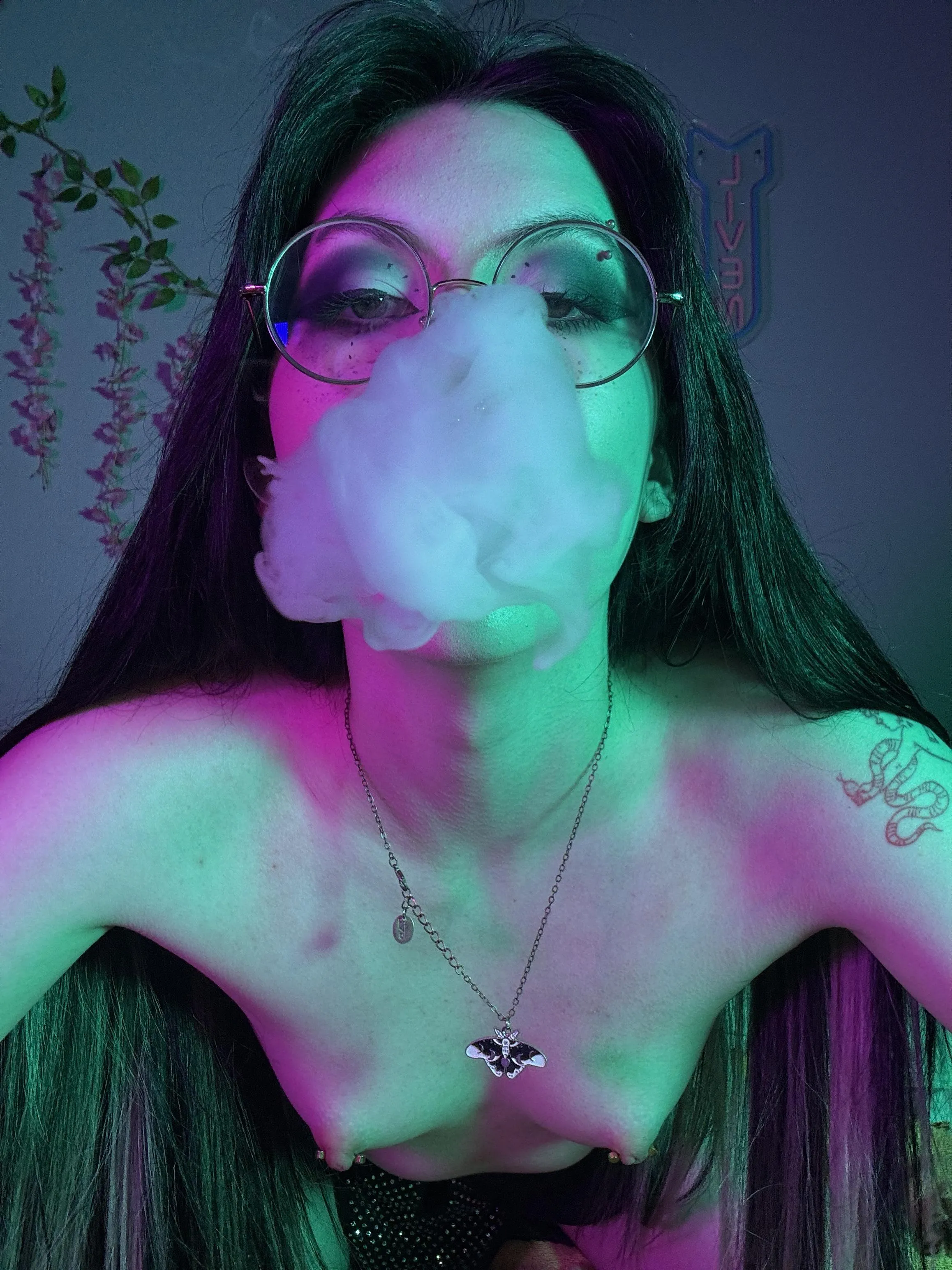 What’s more distracting the smoke, or my nipple piercings?