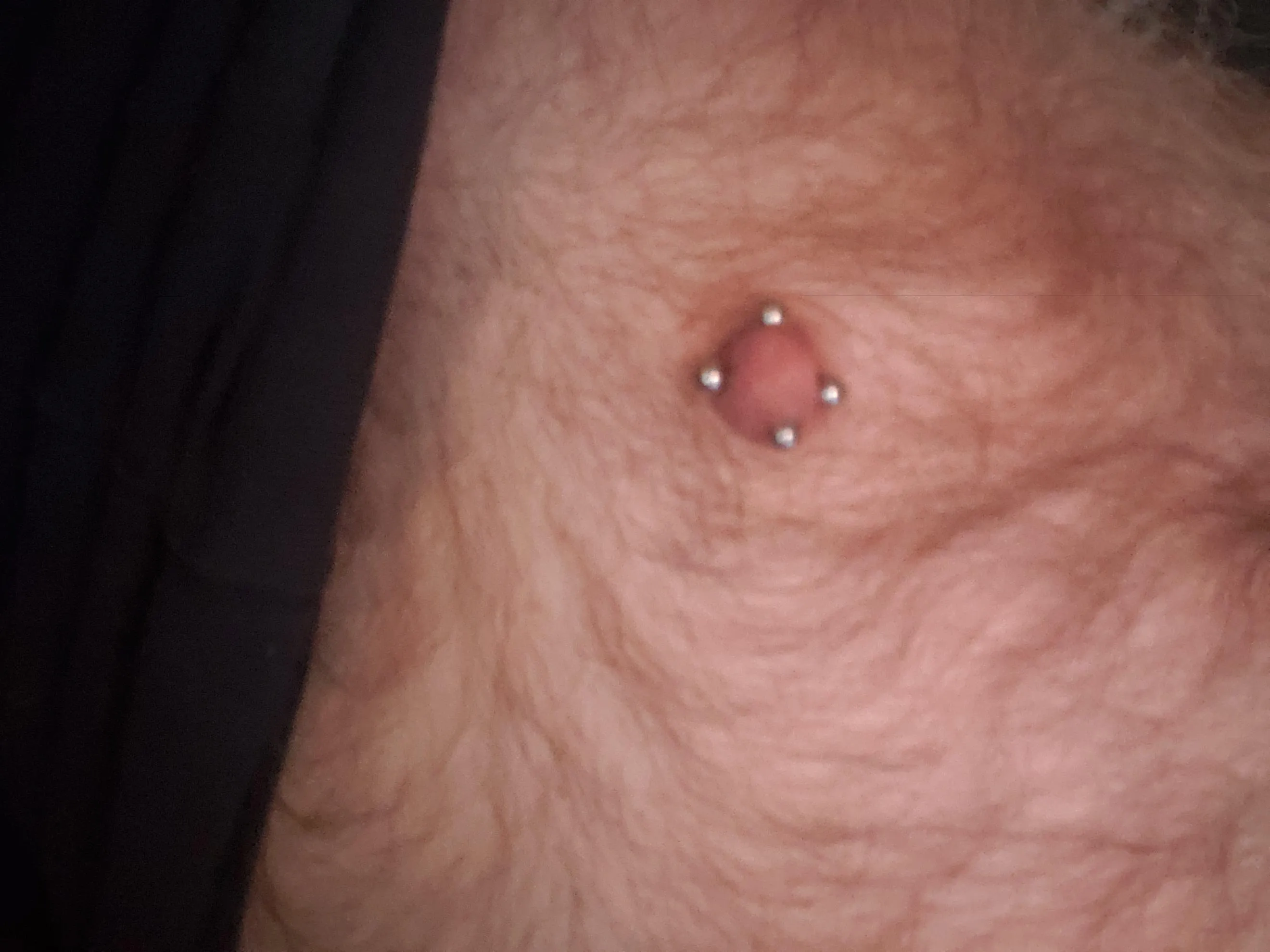 Vertical nipple piercings