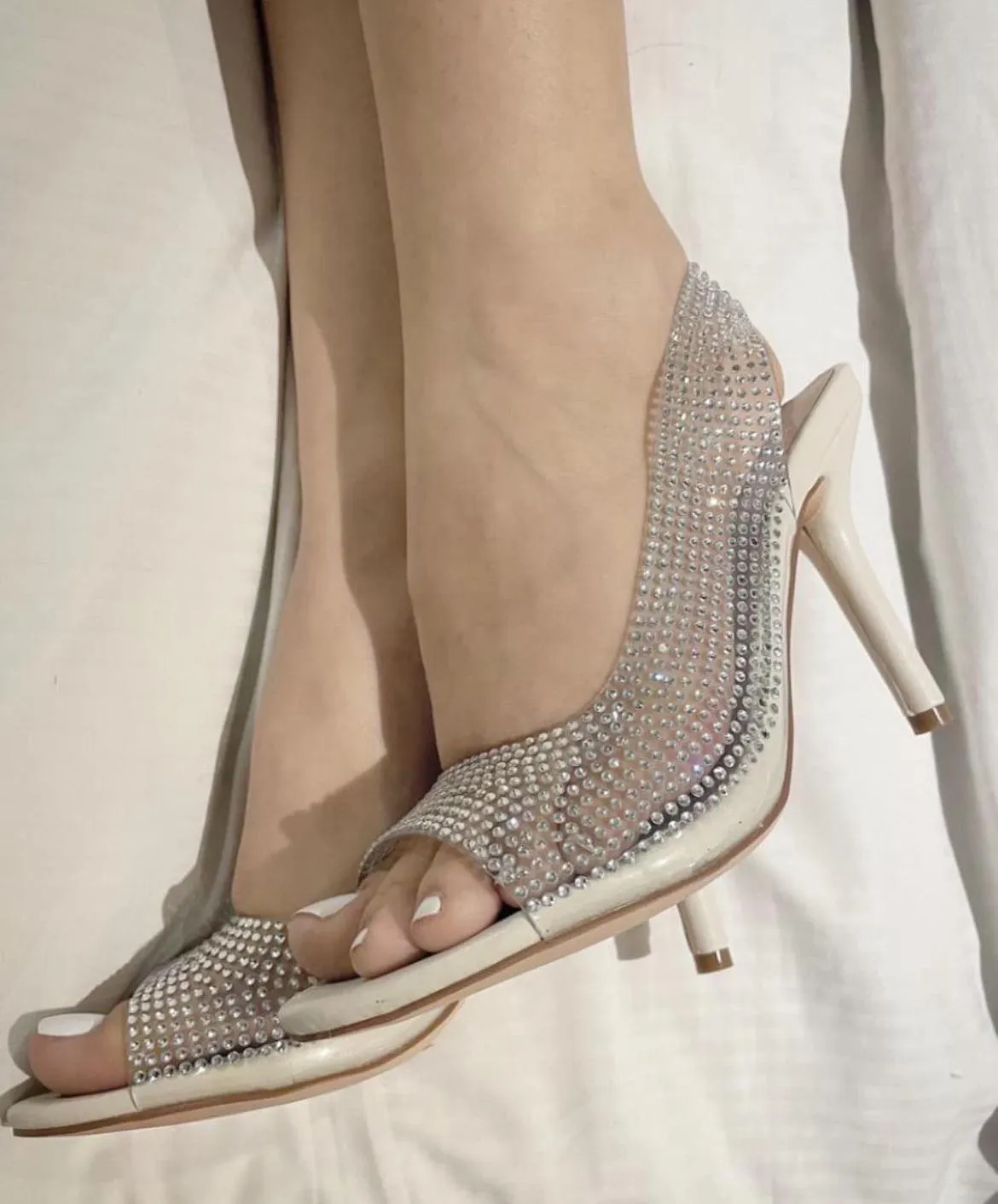 Fresh pedi and crystal heels... these feet are ready for a night out in town...