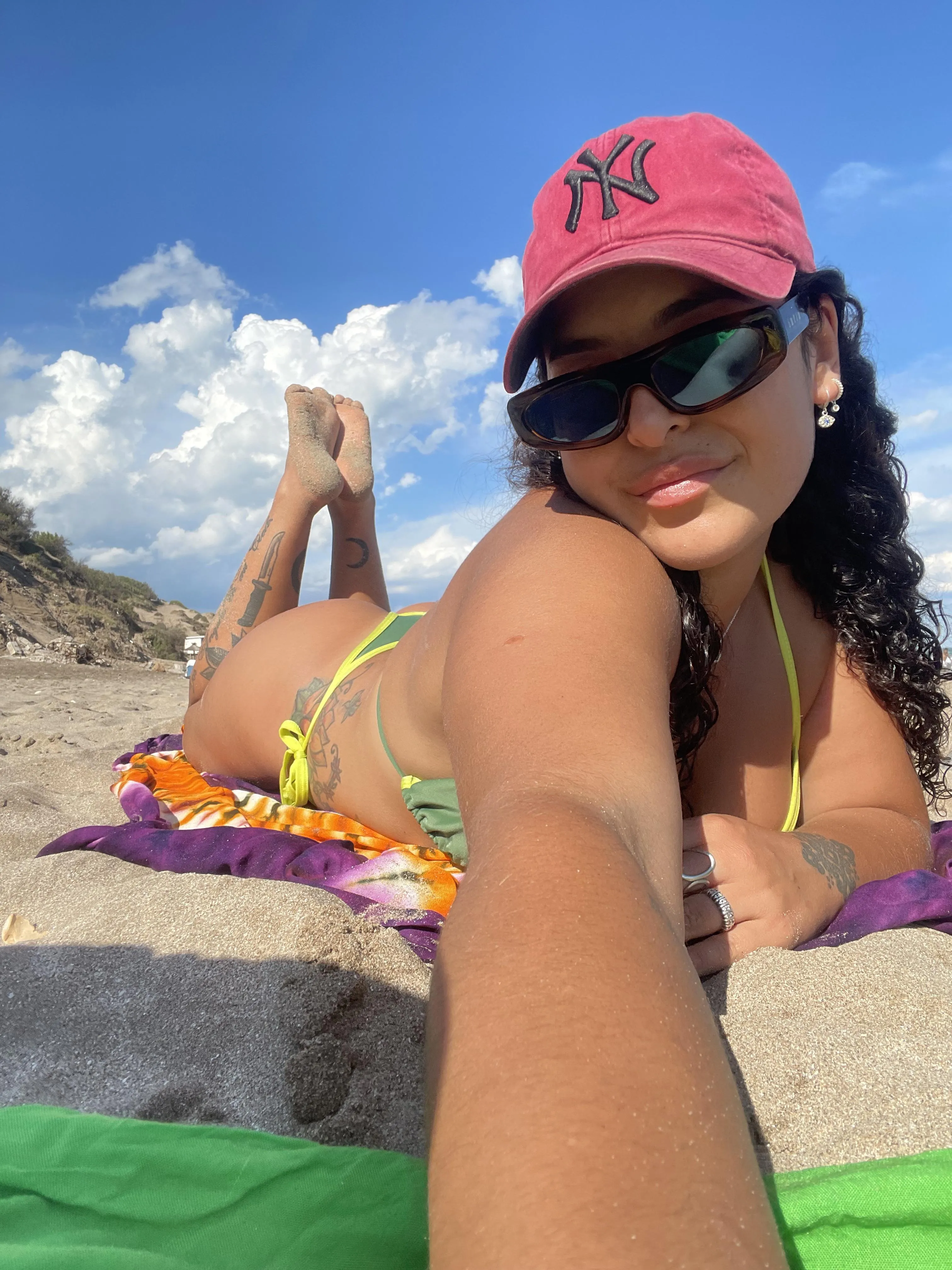 I love the sand on my feet. It tickles and I love it.