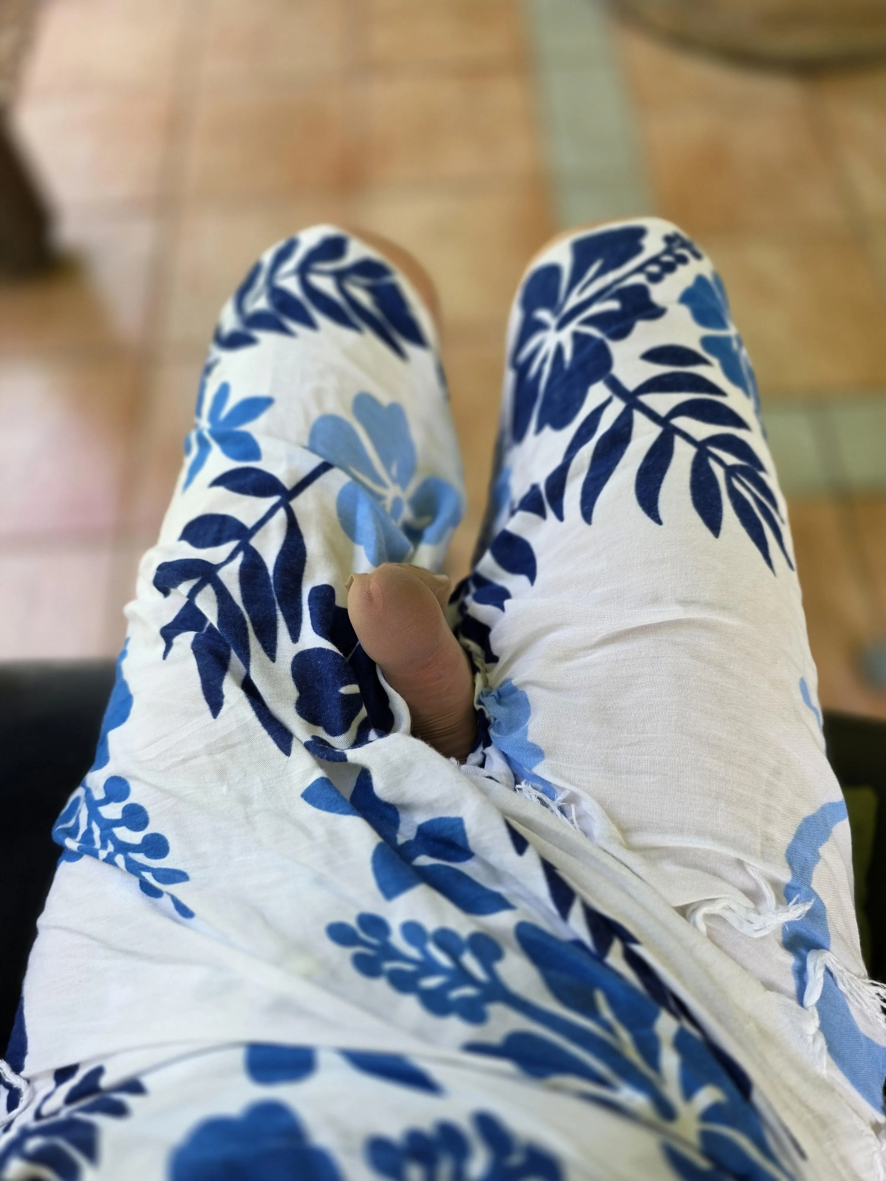 Off to the beach, with nothing but my nylon covered cock under my sarong. I wonder if anyone will notice?