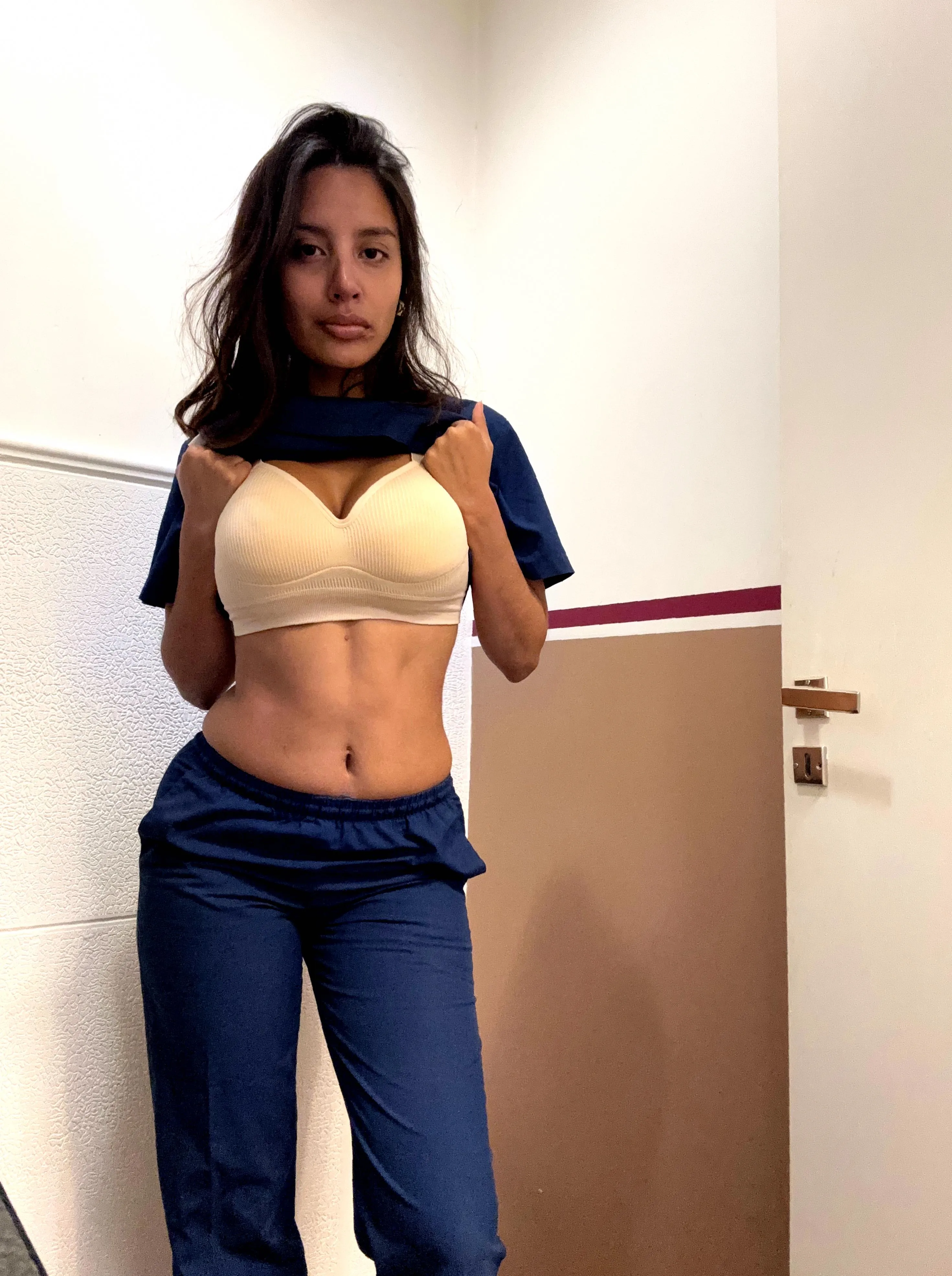 In control but never without a tease