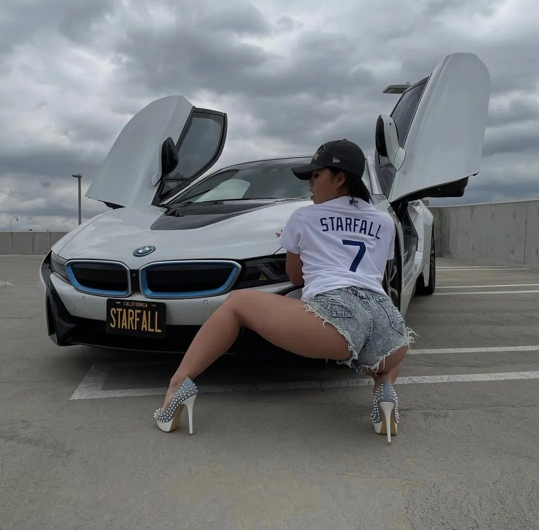 BMW in shorts and high heels