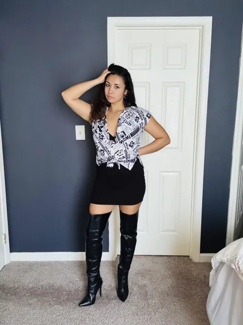 I love how thigh highs show a little bit of skin on the leg.