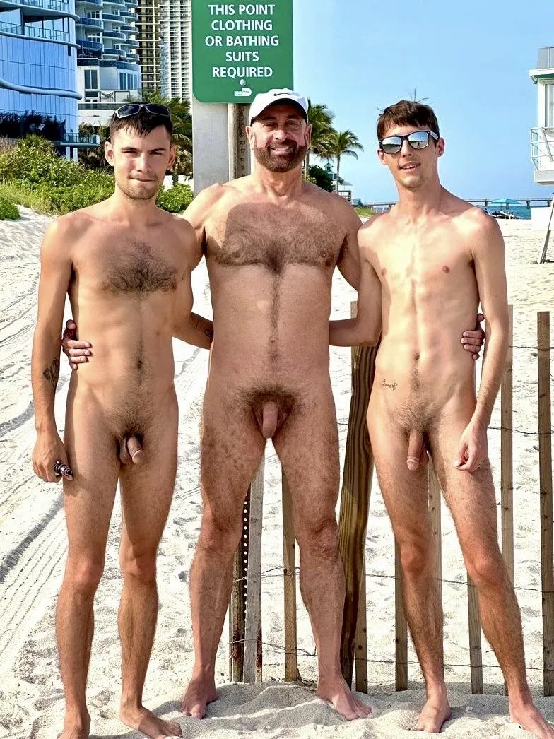 Dad and two sons at the beach