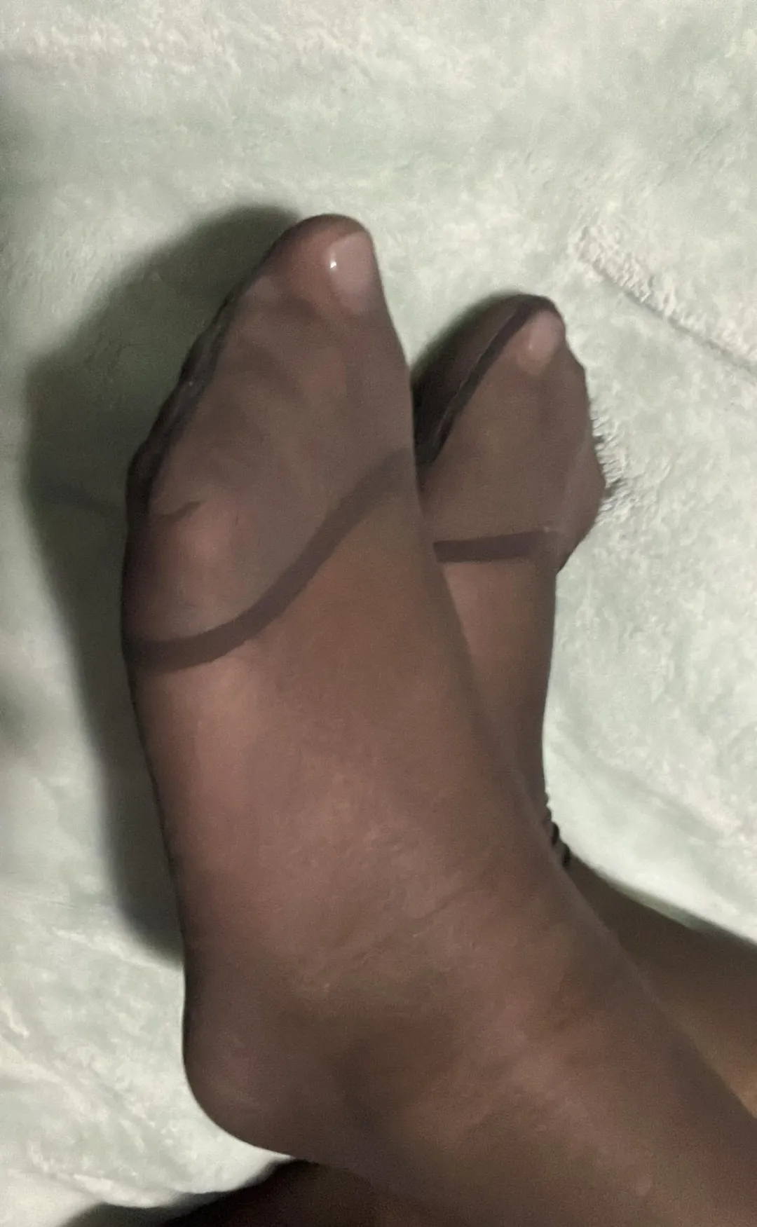 Nylon toes after a long day of work. My feet need pampering