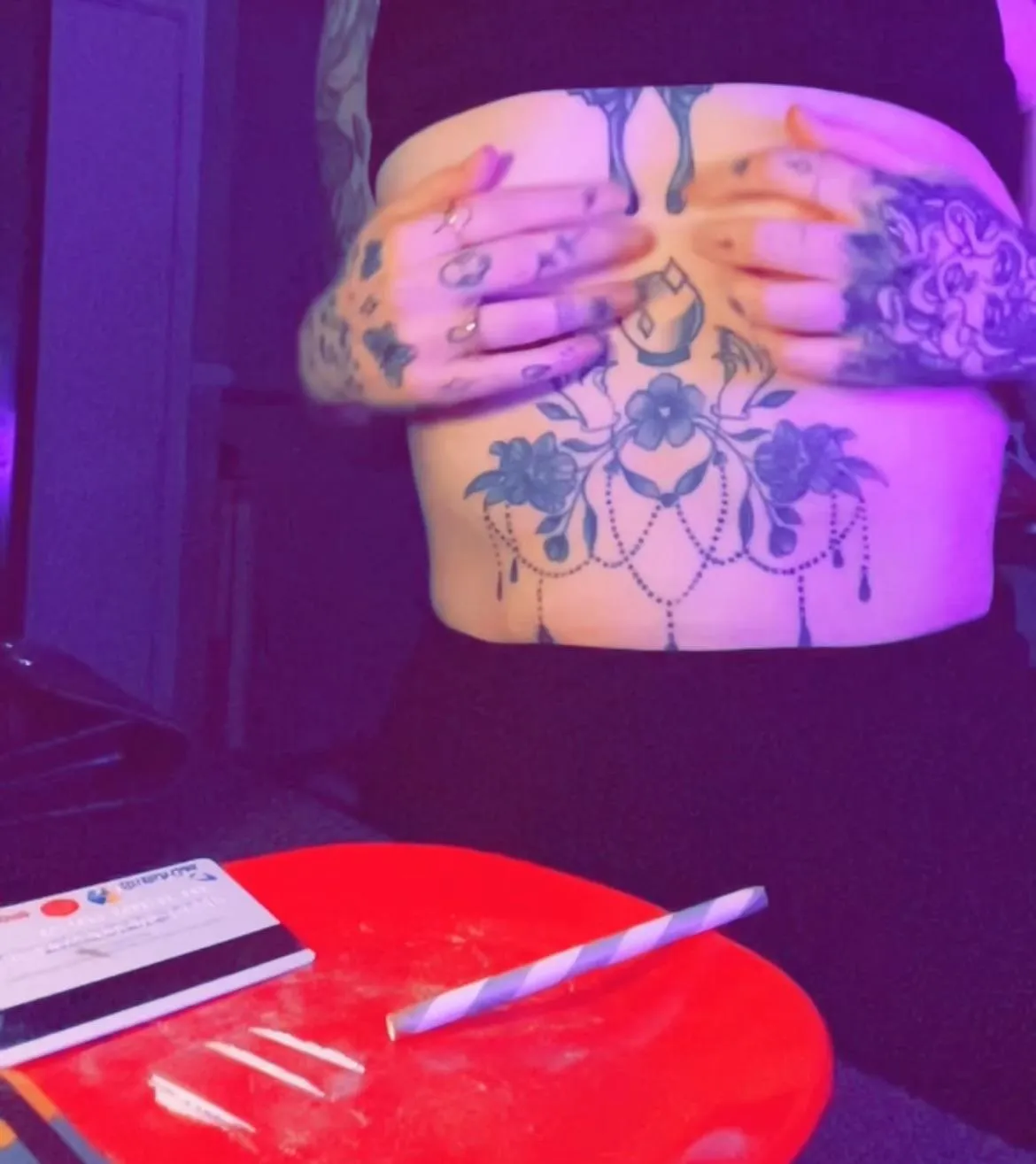 Showing off the tats and the lines
