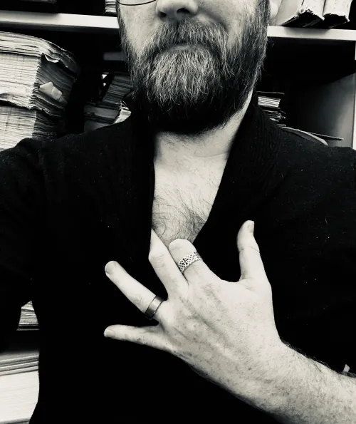 What grabbed your attention, the books or my hand?