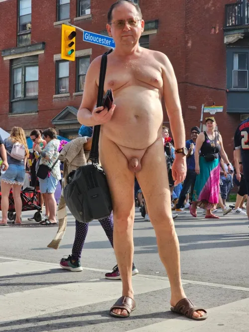 Walking naked in Toronto and posing for photo to everybody