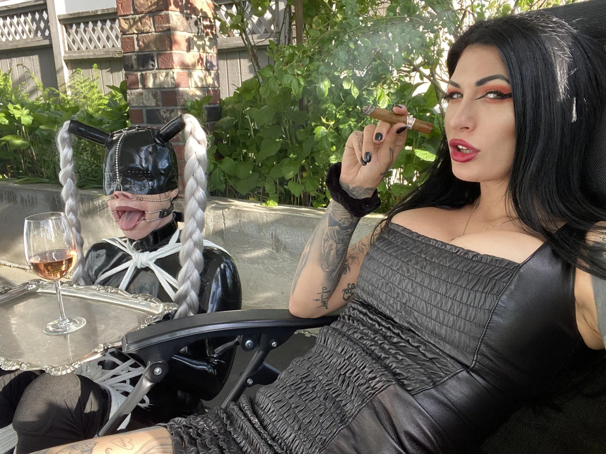 Mistress Damazonia, with her personal ashtray Natalie Mars