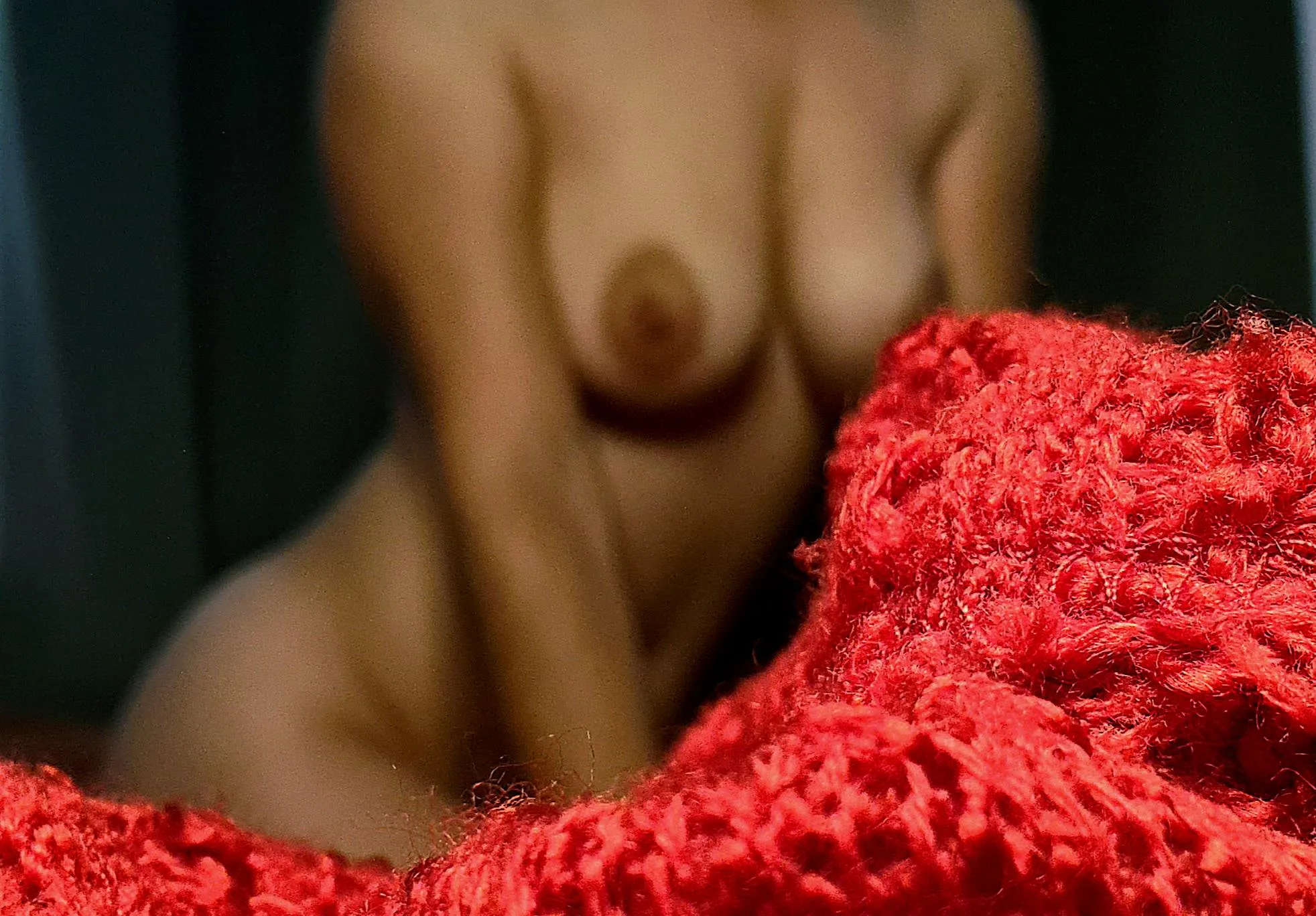 Soft curves , warm skin...just and just a hint of red .Should I show you more?