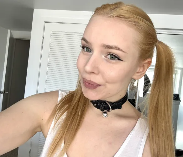 Are you more turned on by the pigtails in this pic… or is it the collar that’s got you feeling things?