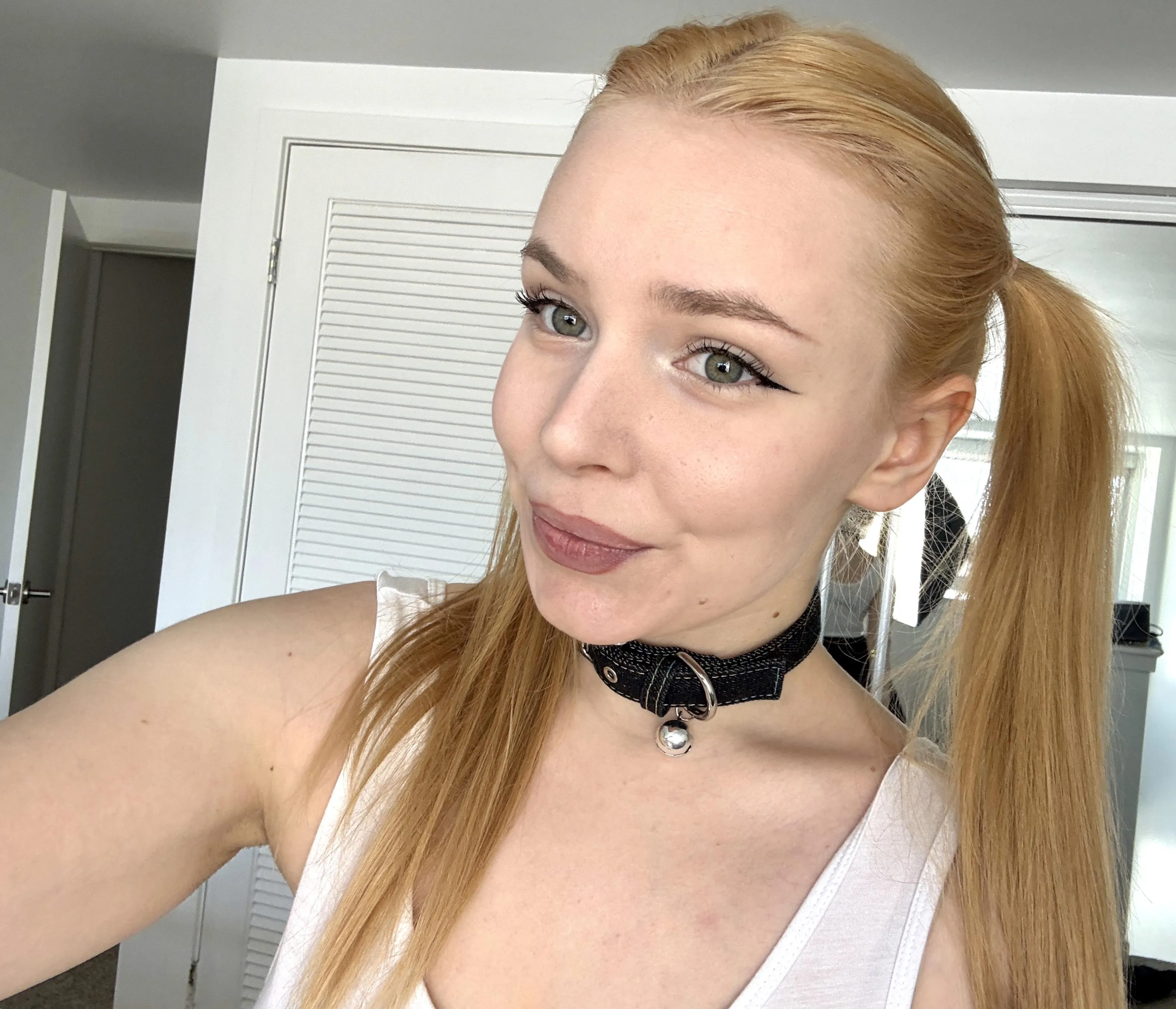 Are you more turned on by the pigtails in this pic… or is it the collar that’s got you feeling things?