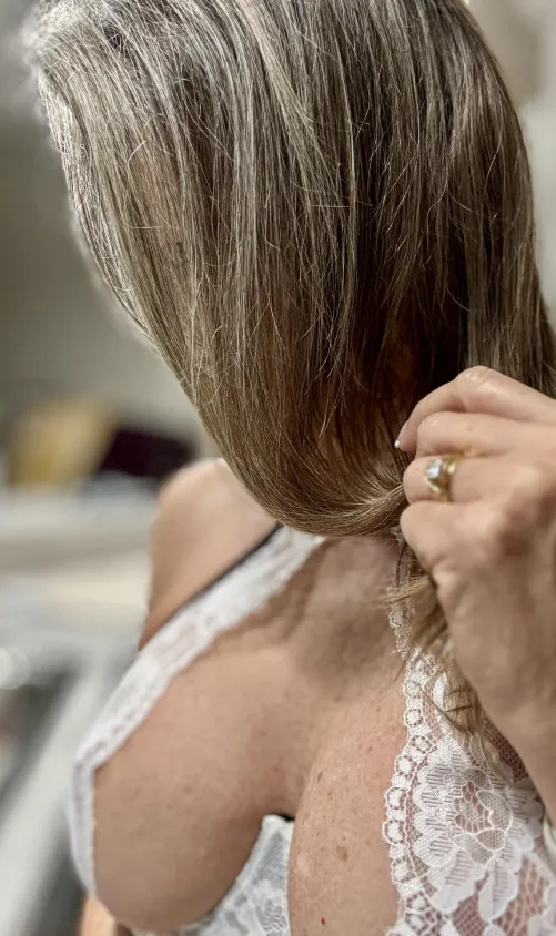 I used to be blonde but now I love my “natural, gray highlights!”