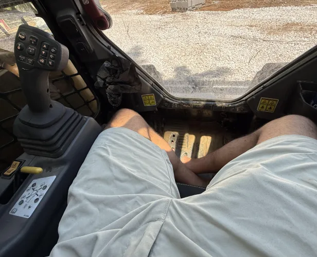 Waiting on gravel in the middle of nowhere on the mountain.