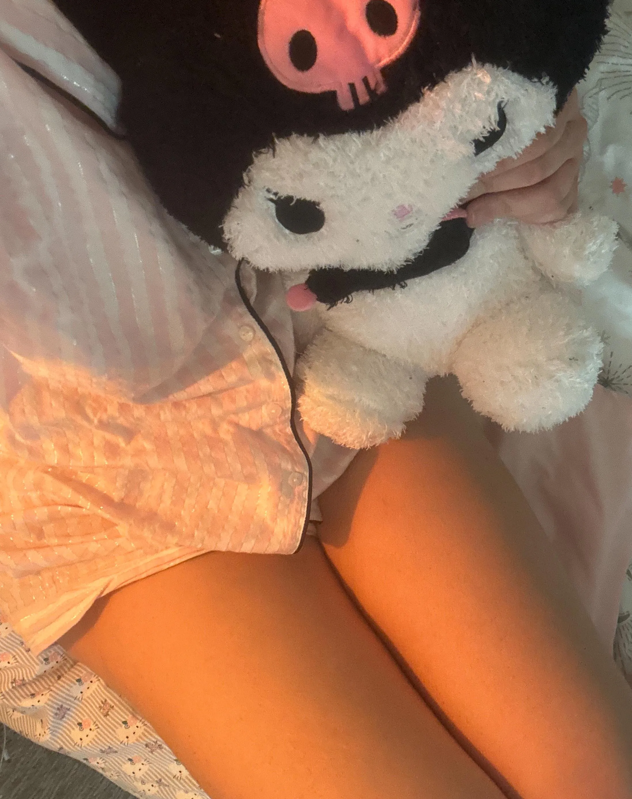 cuddling with my new kuromi stuffie in my new pink pjs😍