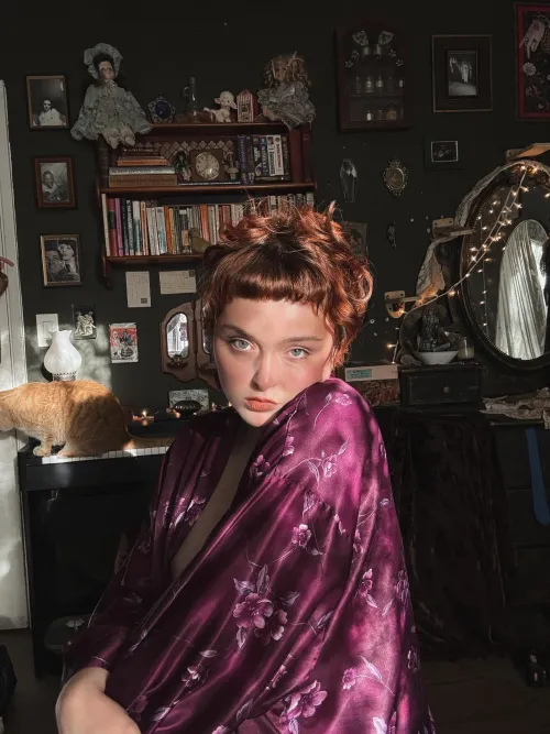 sunshine through lace curtains, silky smooth loose fitting robe.