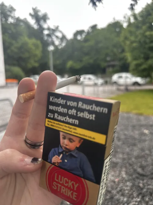 Luckies and staring at a smoking child. Perfect combo