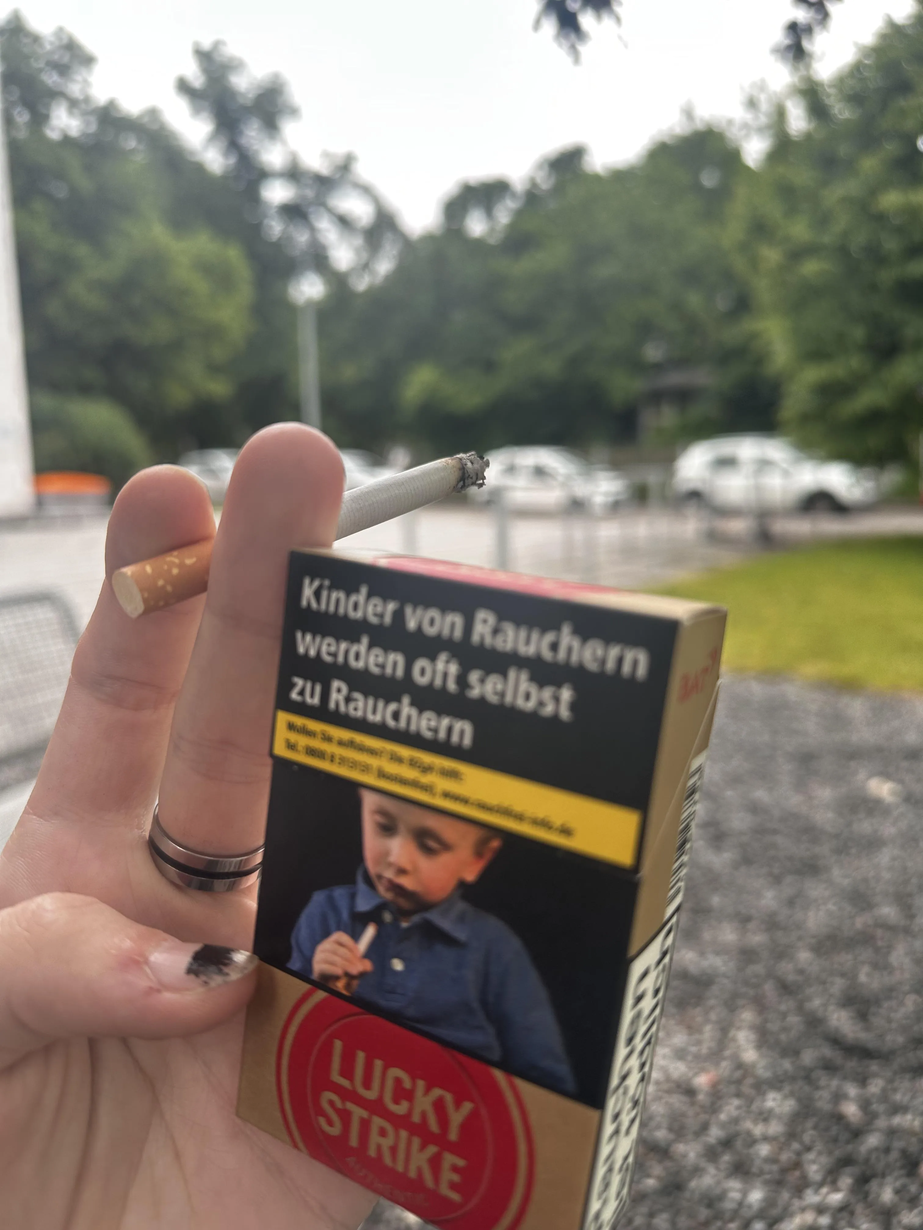 Luckies and staring at a smoking child. Perfect combo