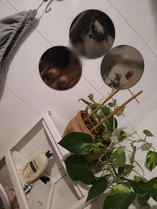 Just a girl and her plant having a shower