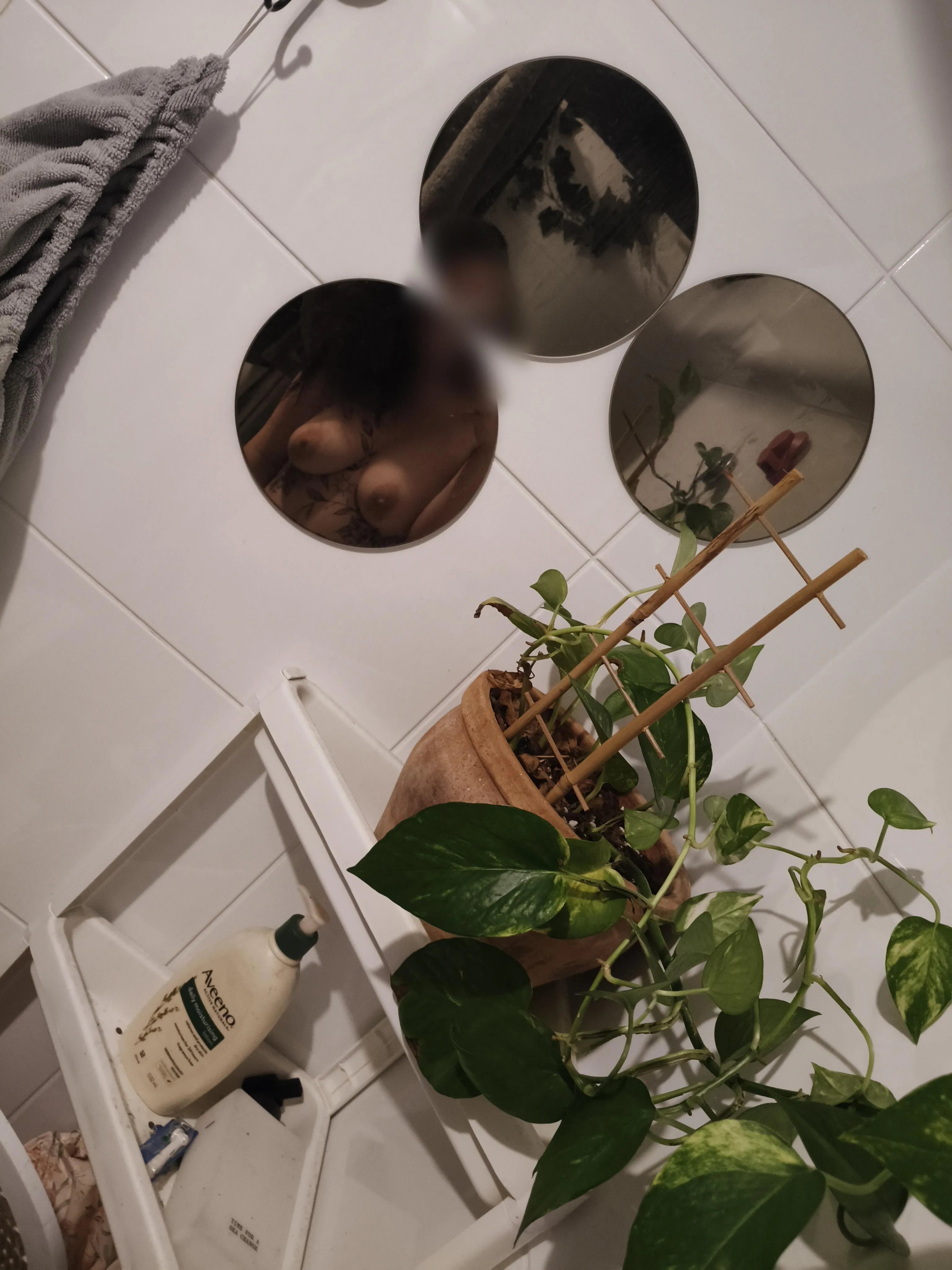 Just a girl and her plant having a shower