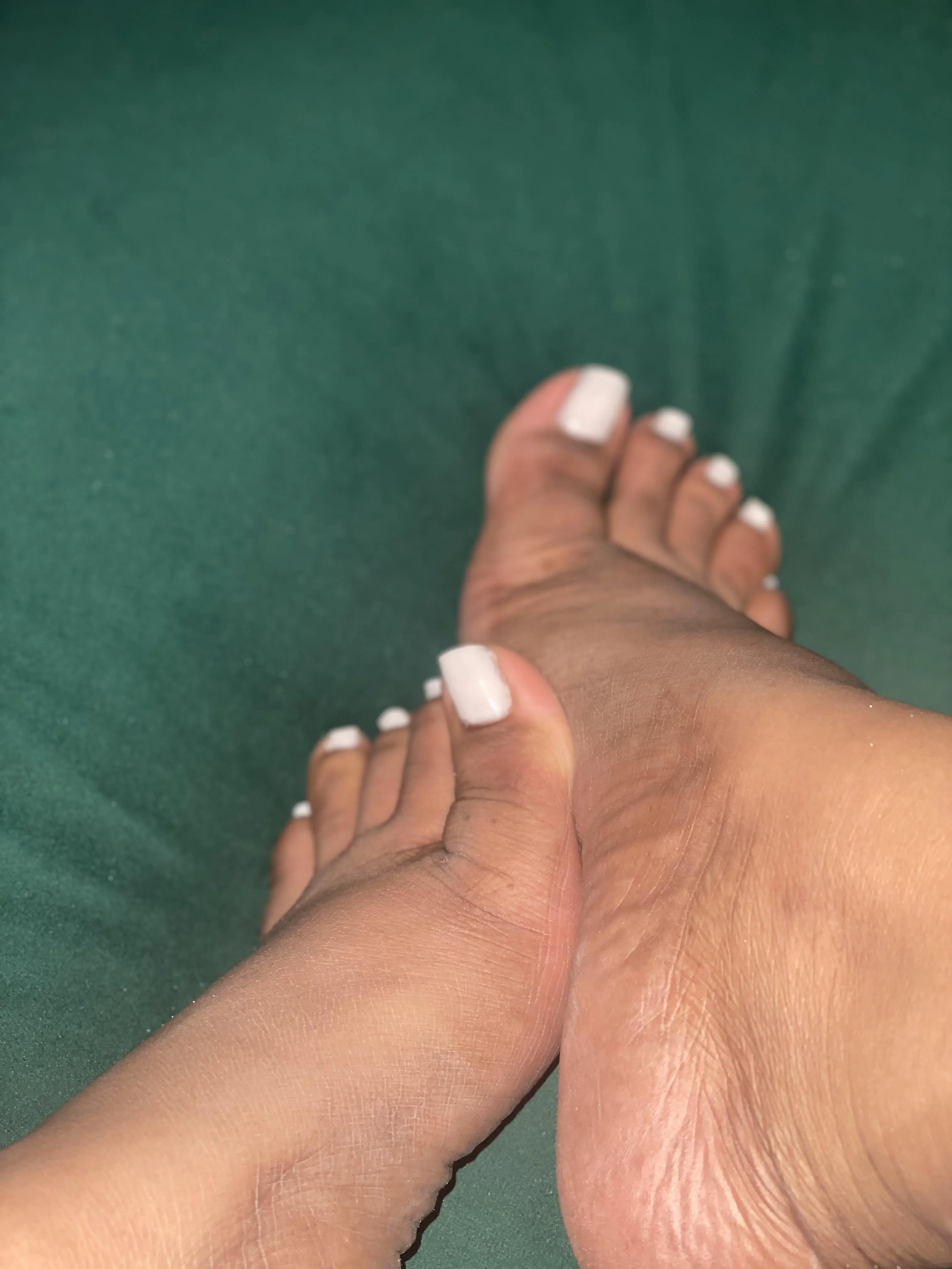 Clean the tiny sand off my toes