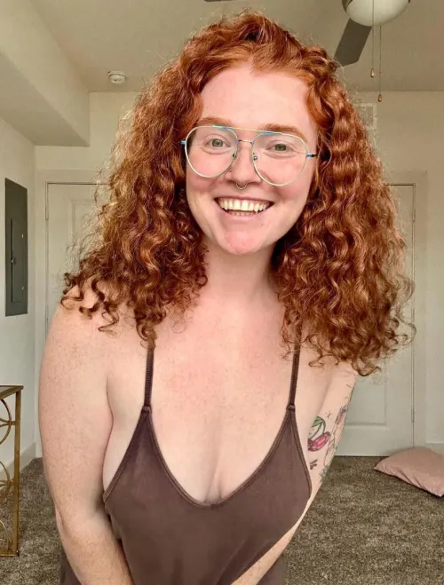 Do redheads look better in brown or green?