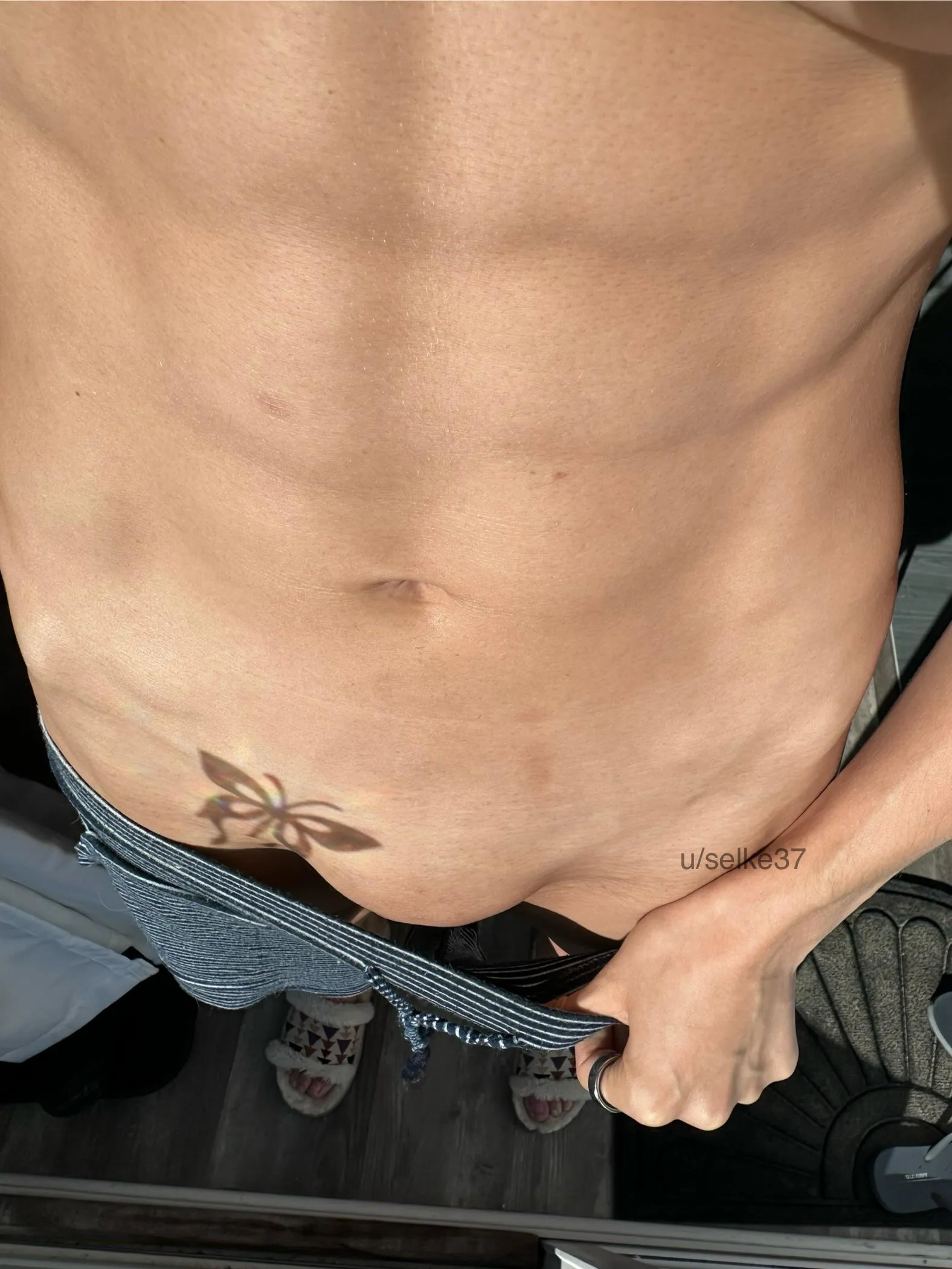 my POV looking down in PJ shorts & slippers