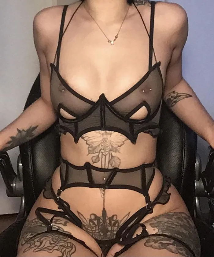 Pierced nipples and black lingerie