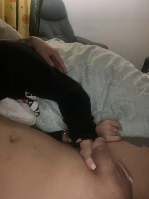 Girl holding my soft penis while we watch a movie