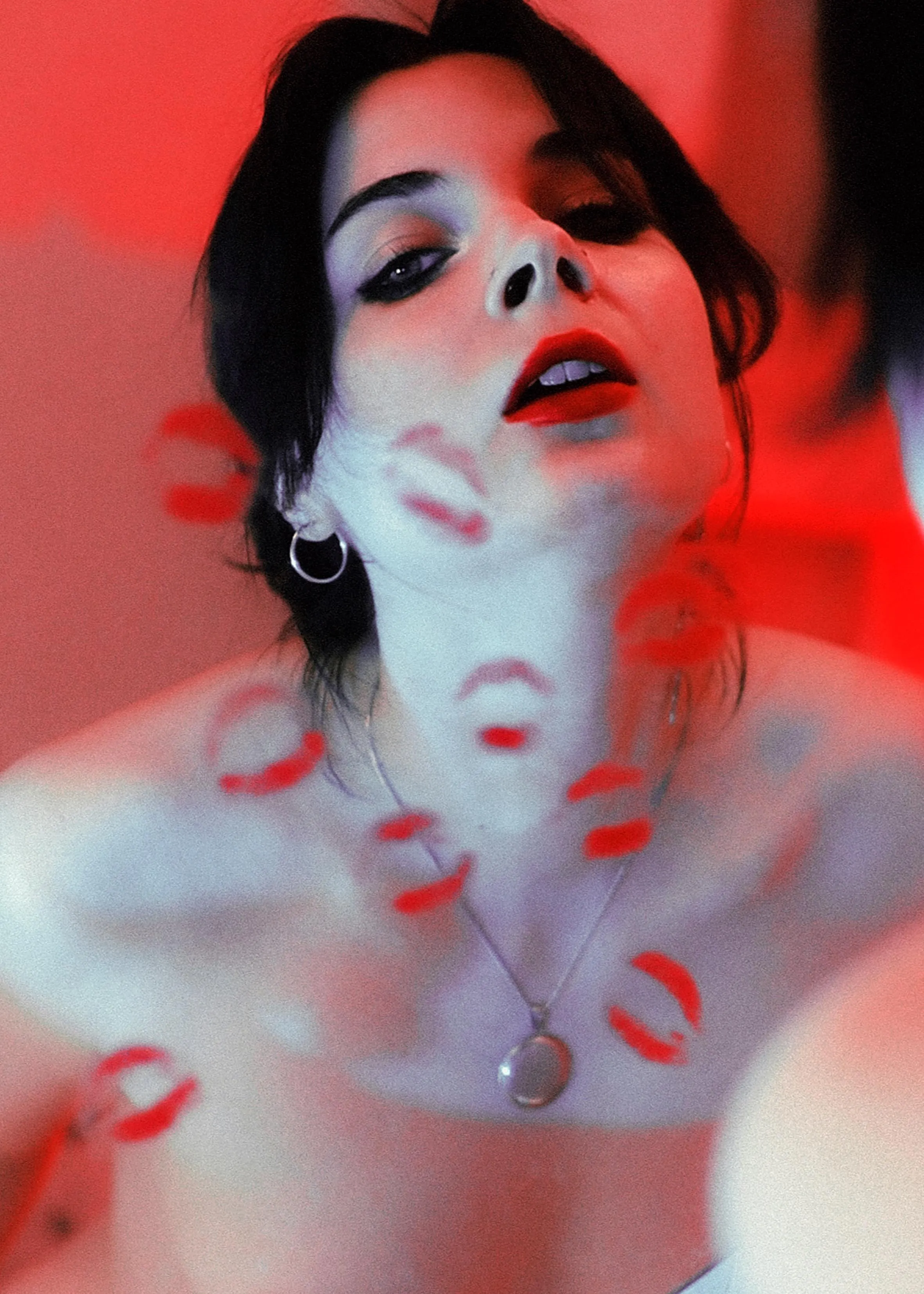 I wonder if my lipstick is enough to completely cover the mirror with kiss marks