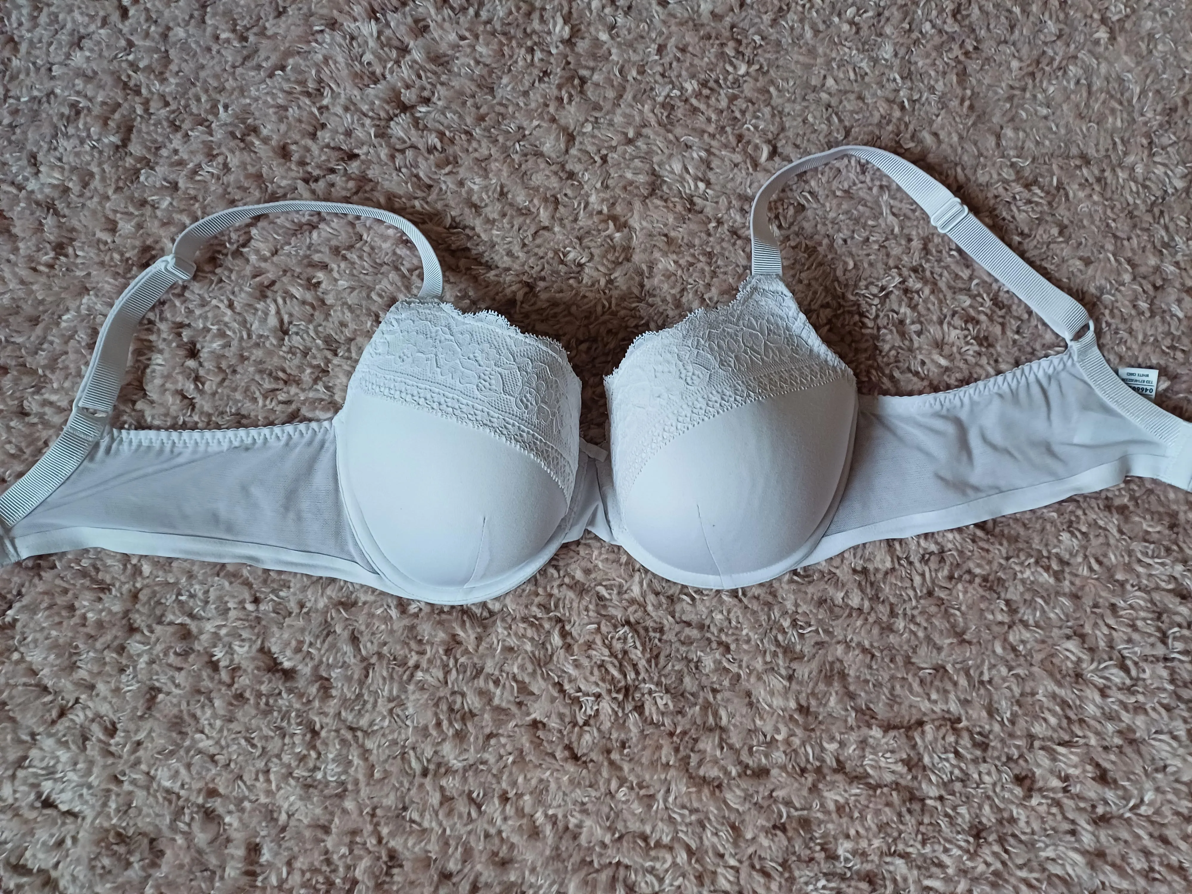 36 C, small but super sexy, I love the large sides on this one, thank you wife :)