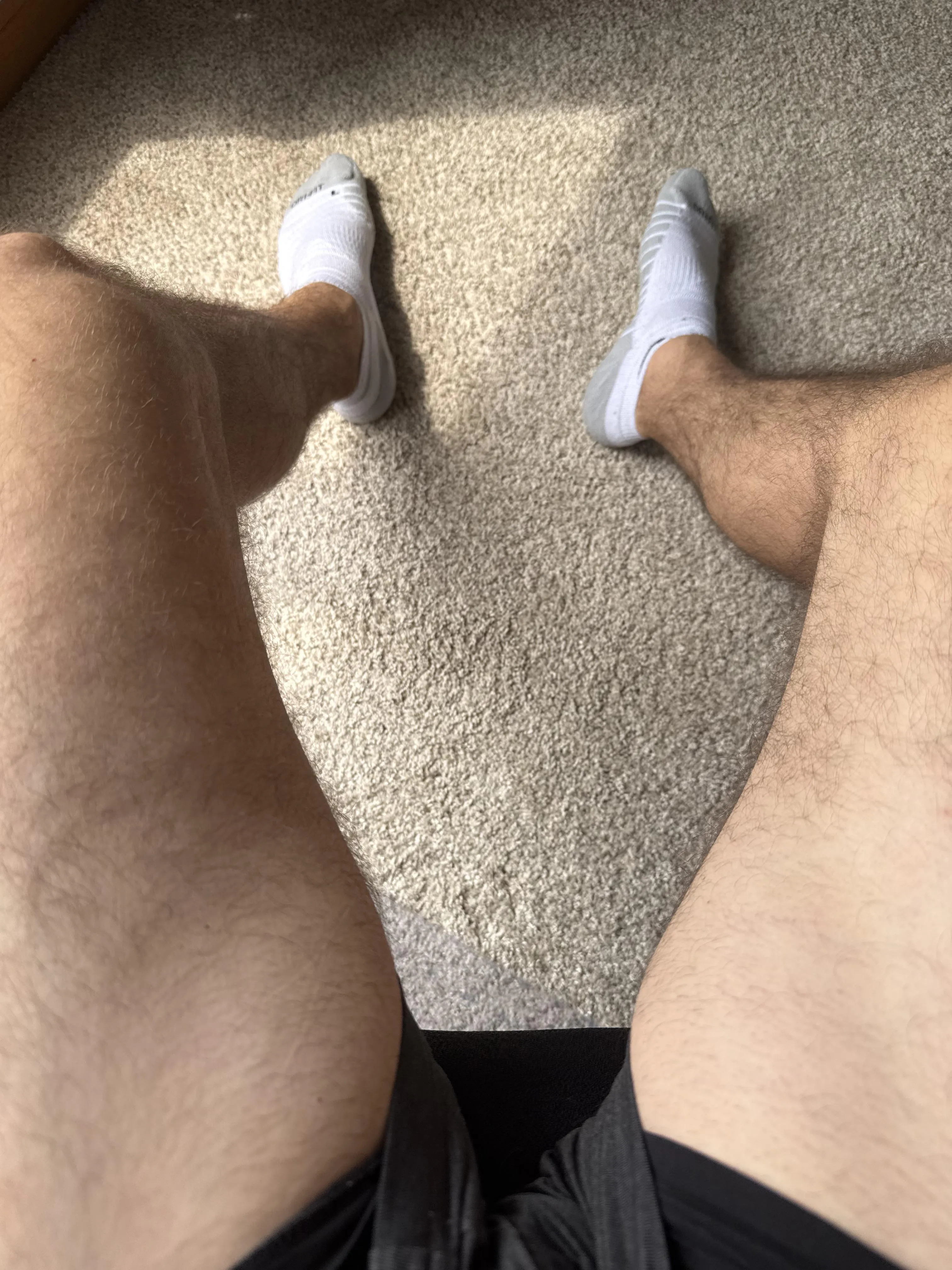 Thighs and sweaty socks after a run