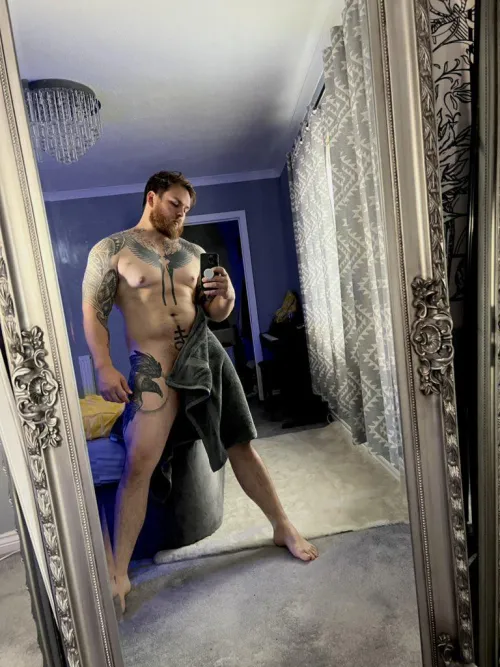 Getting into my work uniform (it’s nakie)