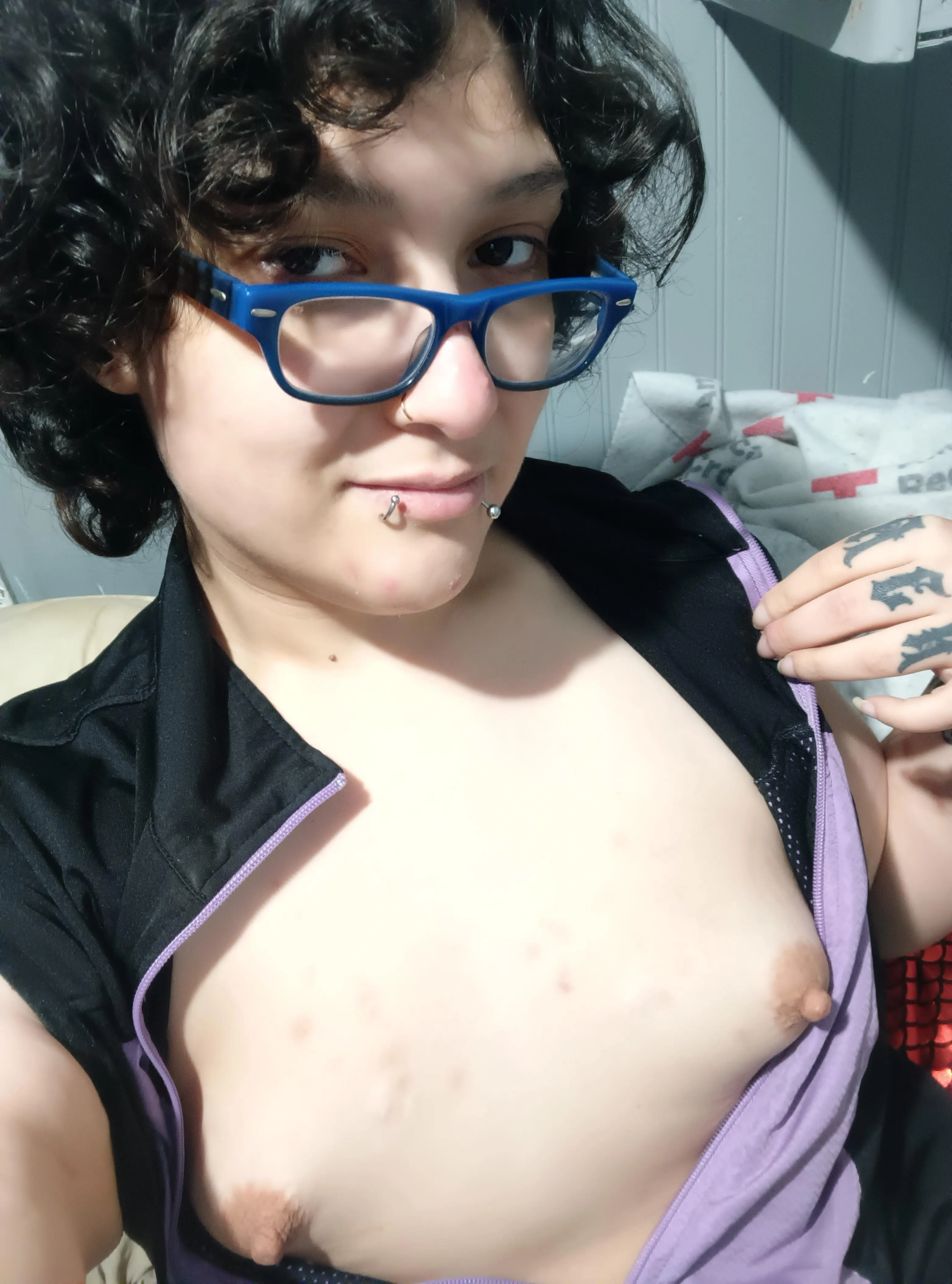 Unzipped my shirt to show off my lil tubies :p achey today so they're getting more rubs 🤭