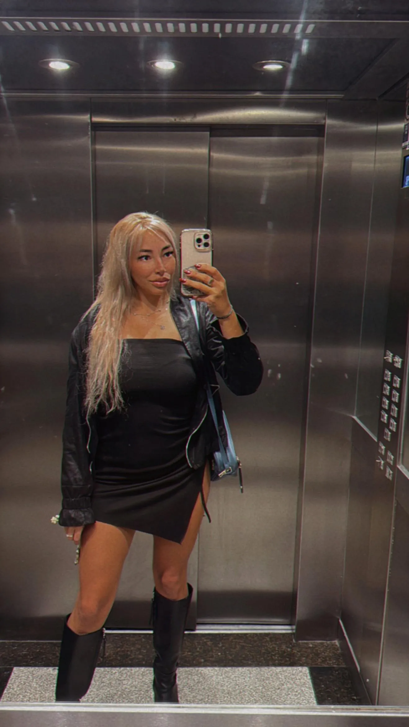 I wear black but I light up the rooms