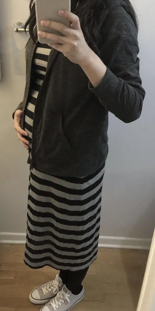 Another pic of pregnant me wearing chucks :)