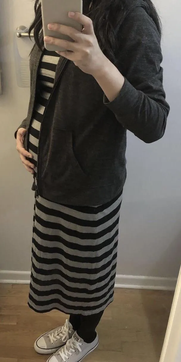 Another pic of pregnant me wearing chucks :)