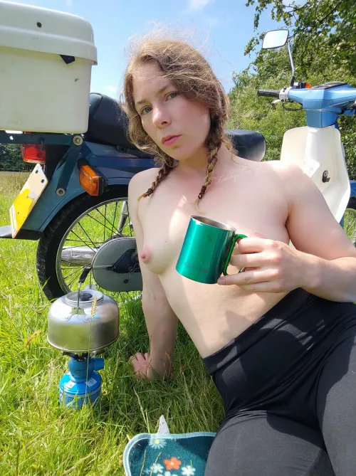 My favourite way to enjoy a cup of tea; in a field with my tits out :D