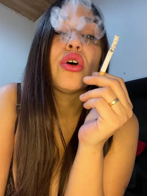 How beautiful the smoke looks coming out of my pink lips