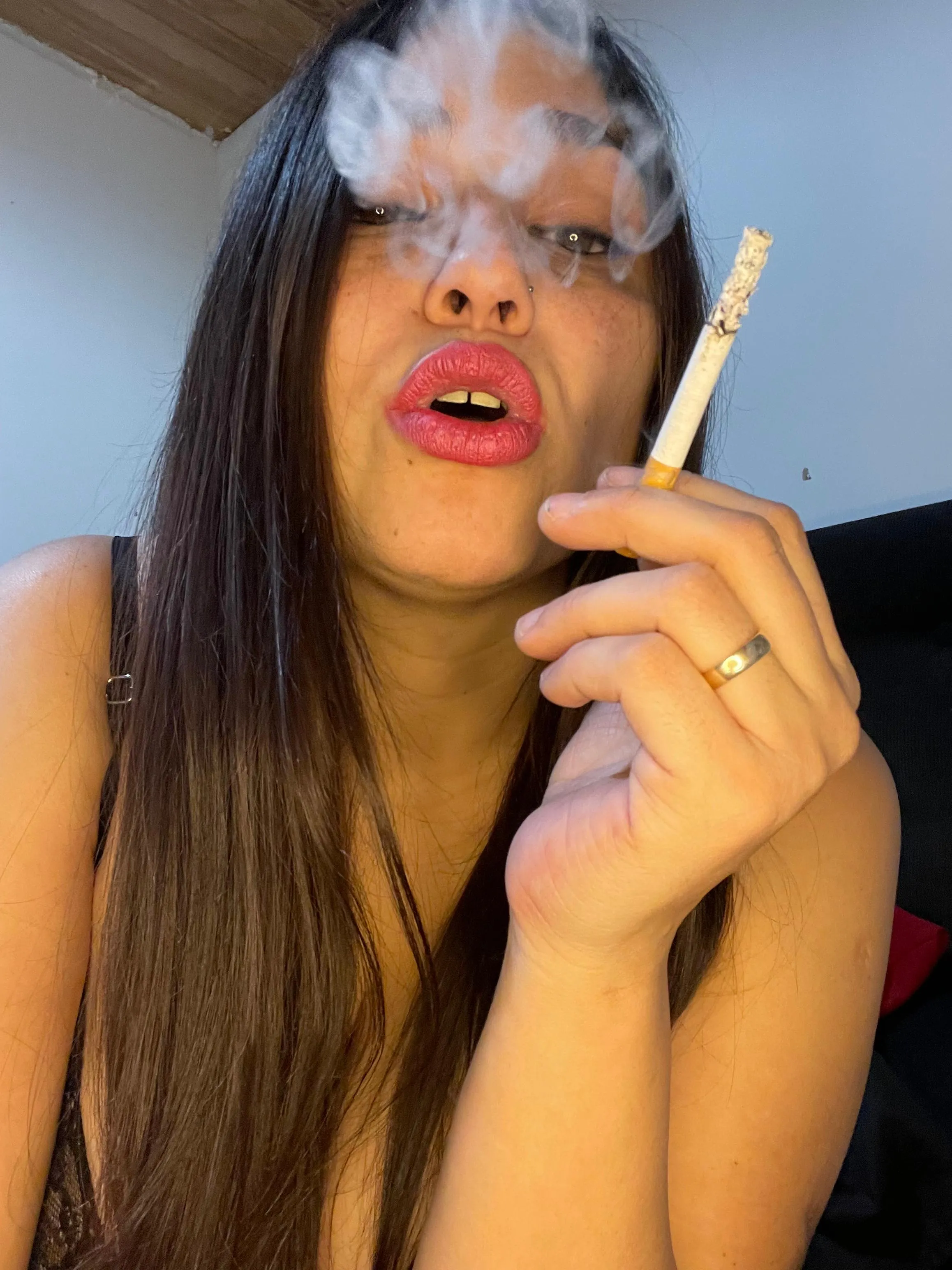 How beautiful the smoke looks coming out of my pink lips