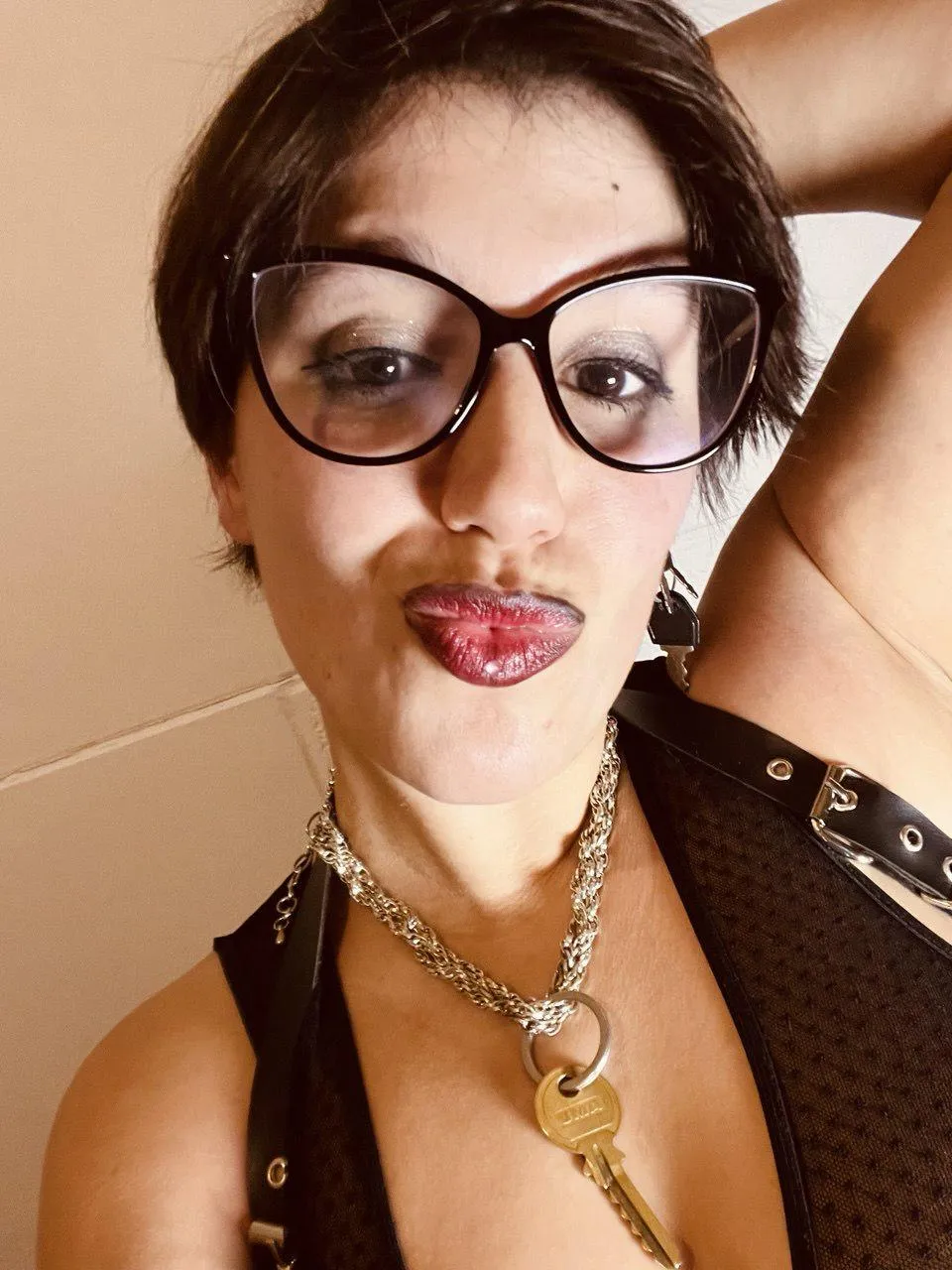 My lipstick stains dreams and crushes egos. One stroke of red, and you're mine.