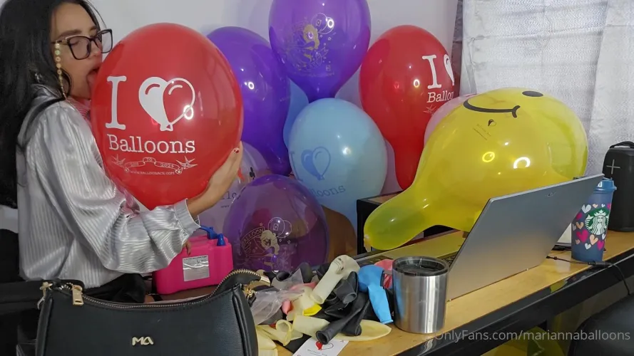 Looner secretary enjoying herself in the office