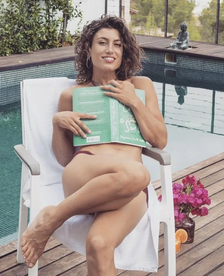 Come join Julia Roca by the pool