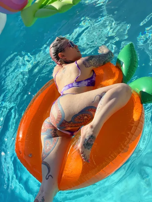 Pool party ass tattoo