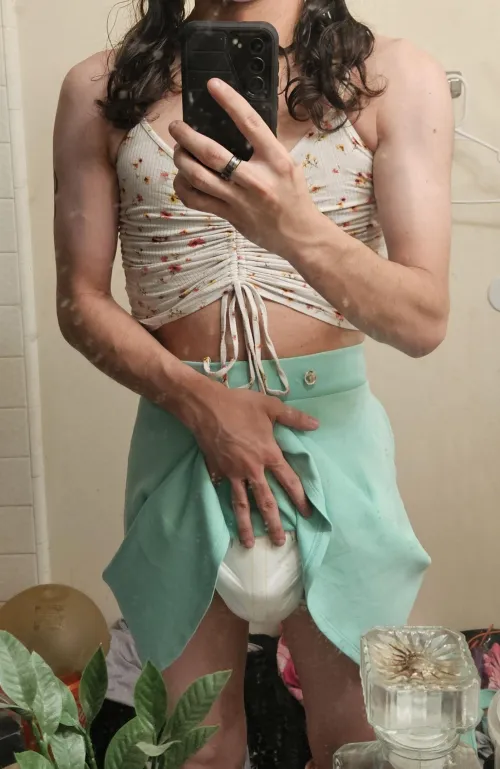 I love being a sissy while having a dildo in and wearing a chastity cage under my diaper