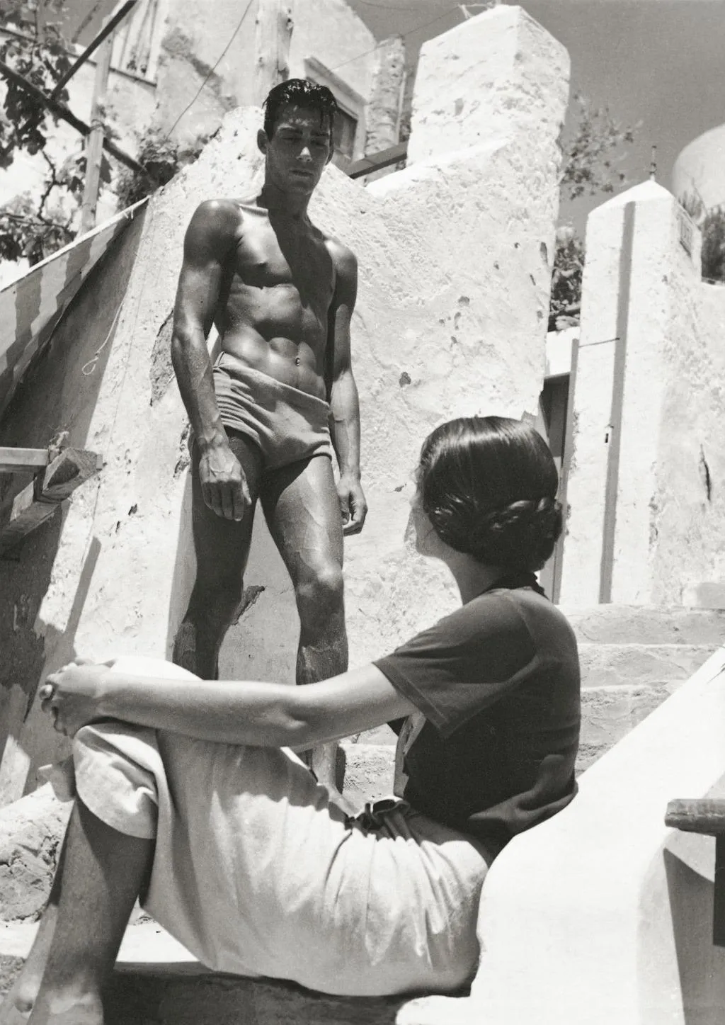 Men want to be seen, wish to serve and wish to be loved too.  Flirt in Capri, Italy. 1936, Herbert List